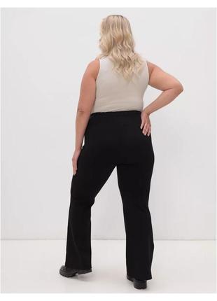 Женские трикотажные брюки батал клеш от колена черный 56-583 фото