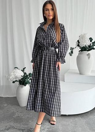 Є відео сукня довга з поясом гудзиками сіра