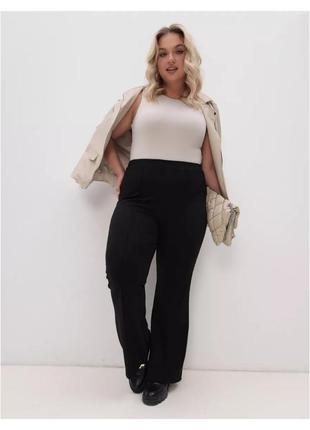 Жіночі брюки кльош великих розмірів трикотаж чорний 58-60