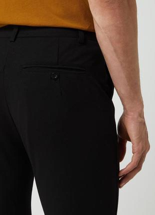 Чорні чоловічі штани трикотажні зі складками3 фото
