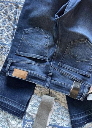 Стильні джинси з розрізами6 фото