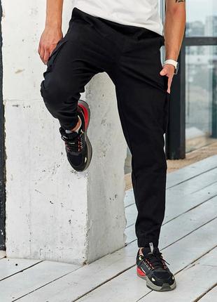 Чорні чоловічі штани карго з накладними кишенями, джогери з резинкою4 фото