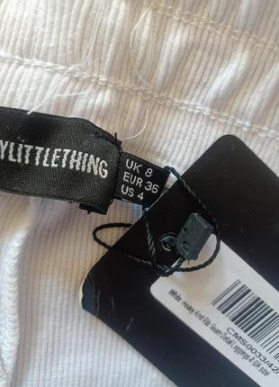 Белые плотные трикотажные леггинсы с реберными швами