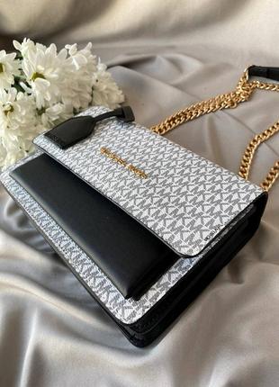 Жіноча сумка michael kors white black