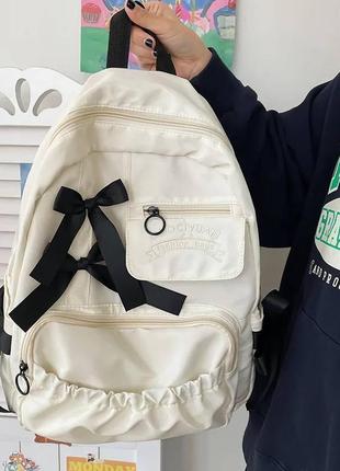 Школьный рюкзак для девочки бежевый с бантиками красивый удобный вместительный9 фото