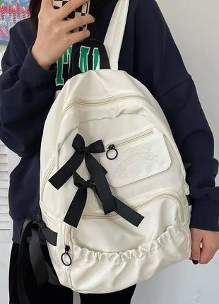 Школьный рюкзак для девочки бежевый с бантиками красивый удобный вместительный6 фото