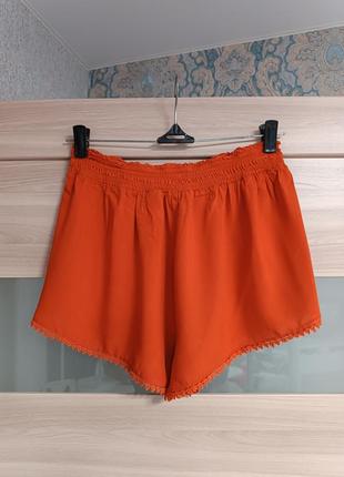 Легкие яркие вискозные шорты сочного рыже-оранжевого цвета4 фото
