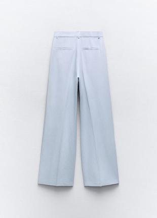 Струящие брюки со складками6 фото
