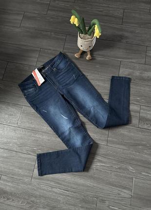 Фірмові джинси