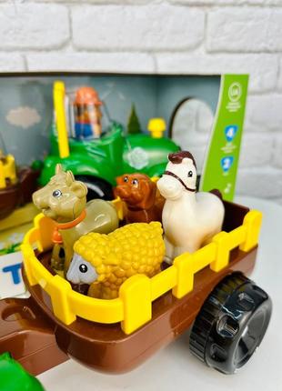 Тракторець з тваринами/ інтерактивний трактор/музична іграшка2 фото