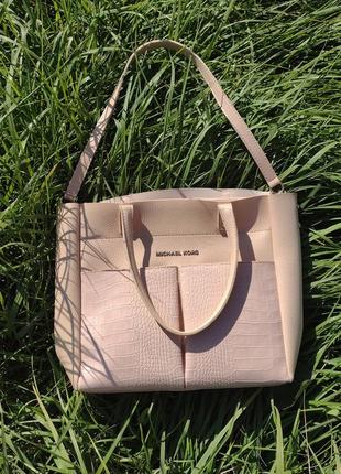 Світло рожева сумка під michael kors