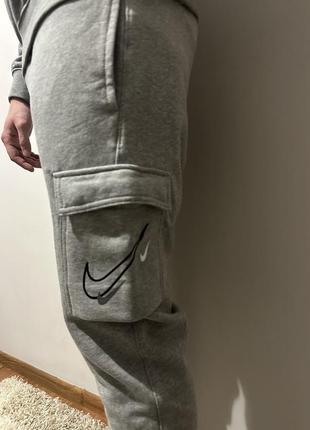 Нові штани карго nike multi swoosh6 фото