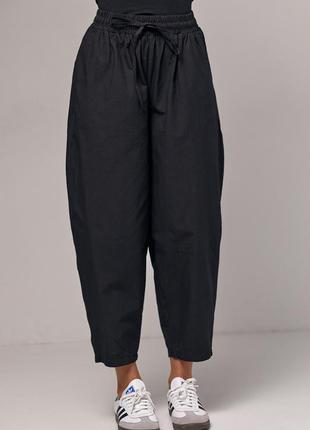 Женские брюки-бананы с карманами2 фото