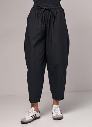 Женские брюки-бананы с карманами5 фото