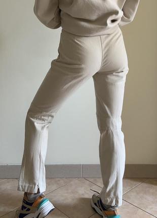 Коттоновые молочные брюки от calvin klein5 фото