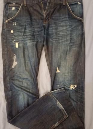 Качественные джинсы с дырками и потертостями