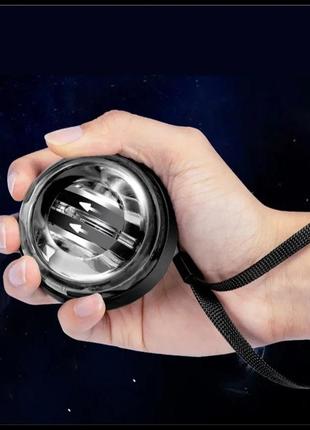 Эспандер ручной гироскопический gyro ball кистевой тренажер для кистей рук с led подсветкой. черный3 фото