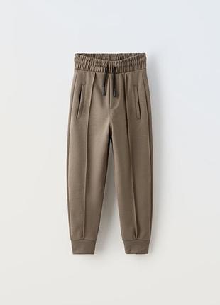 Брюки спортивні