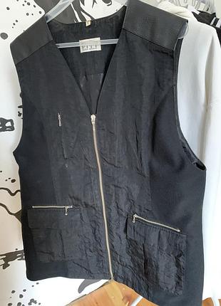Женская жилетка