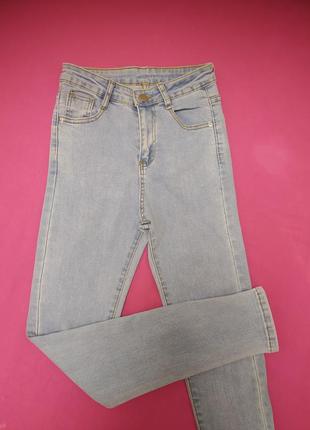 Скинни джинсы высокая посадка щаввшенная талия светлые голубые облегающие1 фото