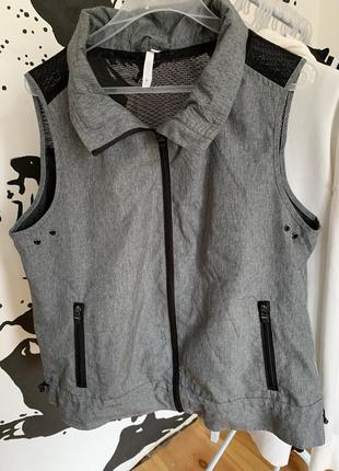 Жилетка жіноча