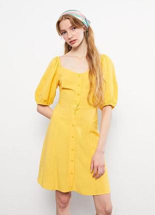 Стильное летнее желтое платье с объёмными рукавами5 фото