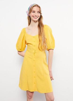 Стильное летнее желтое платье с объёмными рукавами8 фото