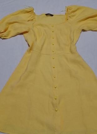 Стильное летнее желтое платье с объёмными рукавами1 фото