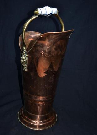 Подставка под зонтик.