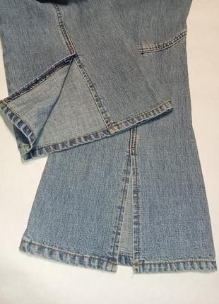 Винтажные джинсы клеш с разрезами4 фото