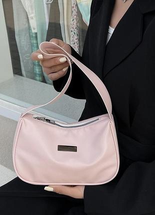 Компактна світло-рожева сумочка багет3 фото