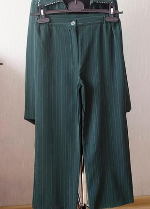 Фірмові кюлоти в школу з гумками по боках на дівчинку