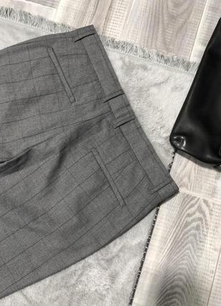Сірі класичні брюки з карманами6 фото
