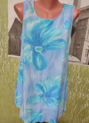 Яркая блузка- туника с цветочным принтом2 фото