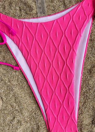 Женский раздельный купальник из рельефной ткани на завязках ladaza розовый6 фото