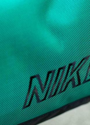 Спортивна дорожня сумка nike чоловіча тканинна зелена для тренувань в залі на 60 літрів10 фото