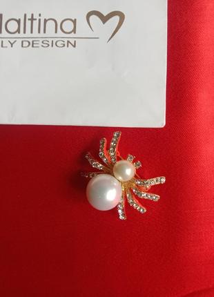 Брошка maltina
