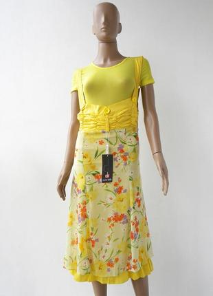 Яркая молодежная юбка в желтых тонах с лямками 44-48 размеры (38-42 евро-размеры).1 фото