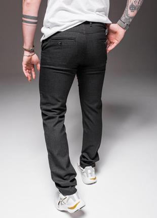 Повседневные мужские брюки черные в клетку2 фото