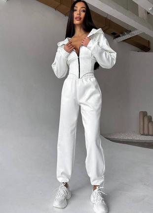 Молочный женский прогулочный костюм брюки укороченная кофта с имитацией корсета замшевый женский замшевый повседневный костюм7 фото