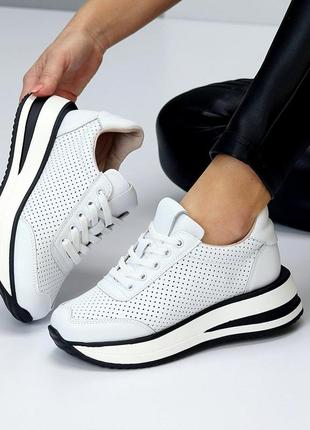 Натуральные кожаные белые кроссовки с сквозной перфорацией8 фото