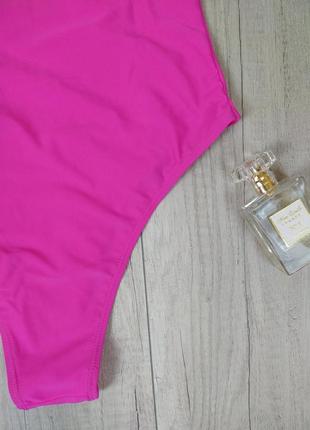 Женский слитный купальник розовый размер s6 фото