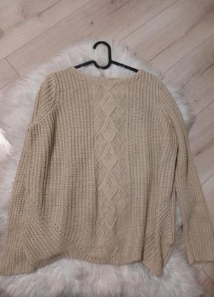 Акрилова яв'язана бежева кофта в рубчик в косичку
