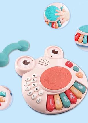 Музична дитяча іграшка телефон жабеня, іграшкове піаніно, пісні, цифри, бряскальце5 фото