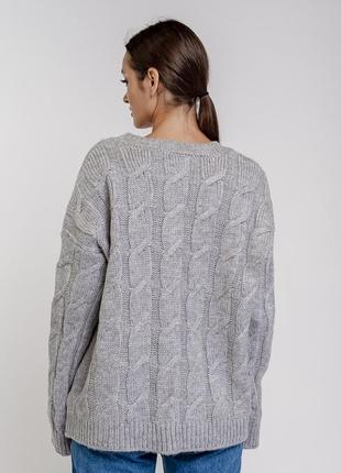 Женский вязаный пуловер оверсайз с косичками2 фото