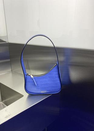 Шкіряна синя сумка-багет fidelitti з текстурою у стилі рептилії