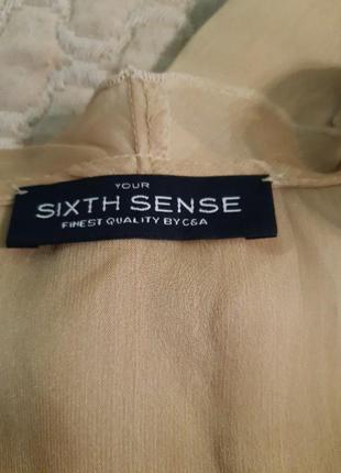 Рубашка- пиджак карамельного цвета с воланами и завязками на рукавах4 фото