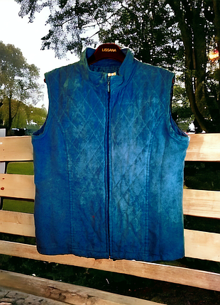 Женская стеганая жилетка увеличенного размера