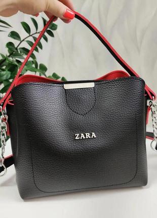 Небольшая женская сумка кросс-боди три отделения черная с красным краем