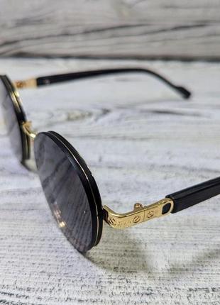 Солнцезащитные очки овальные,, унисекс в золотистой металлической оправе  (без бренда)3 фото